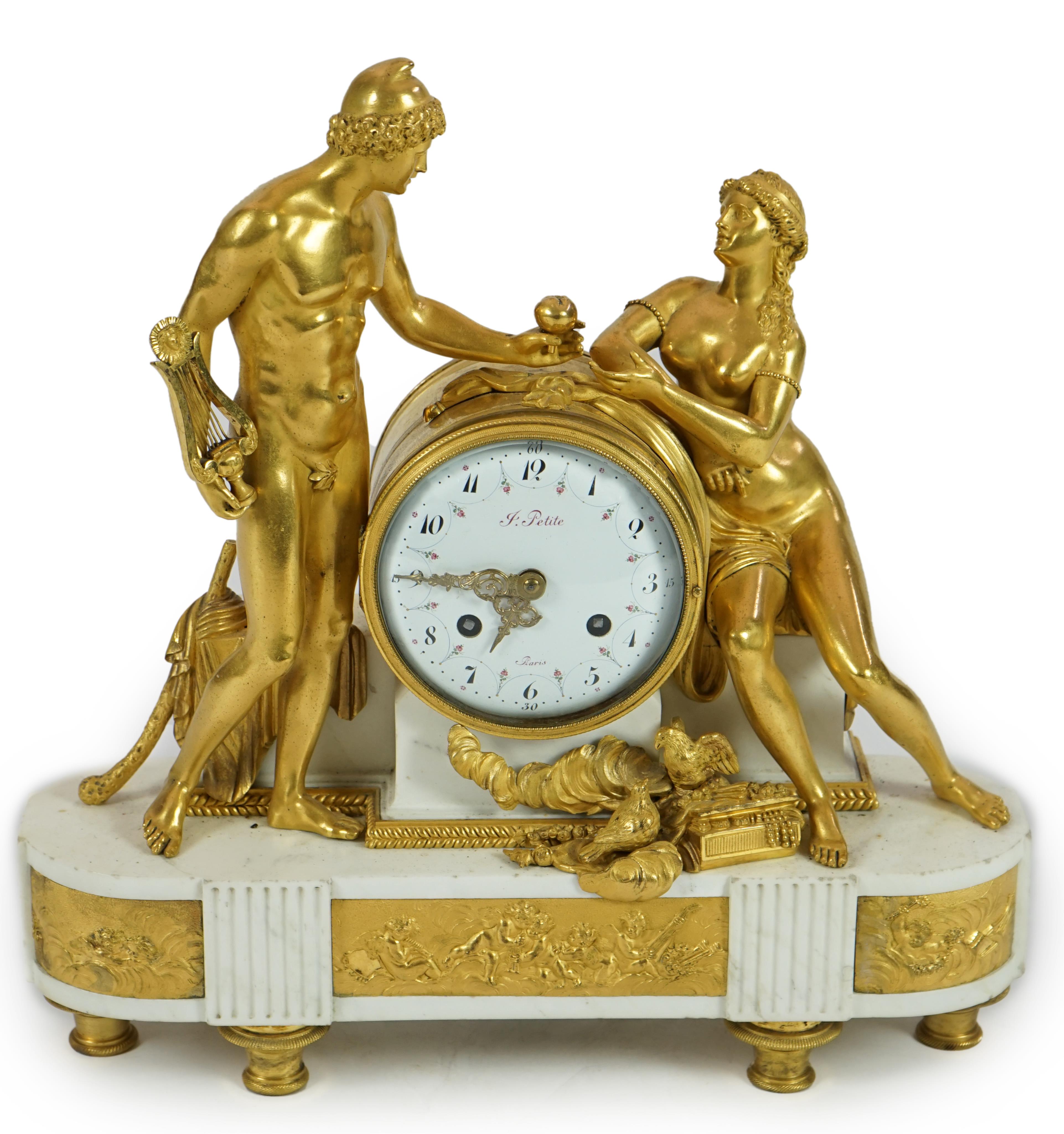 J. Petite of Paris. A 19th century French ormolu and white marble eight day mantel clock